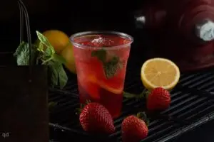 SOL Red Bull with Blueberry and Strawberry Sauce